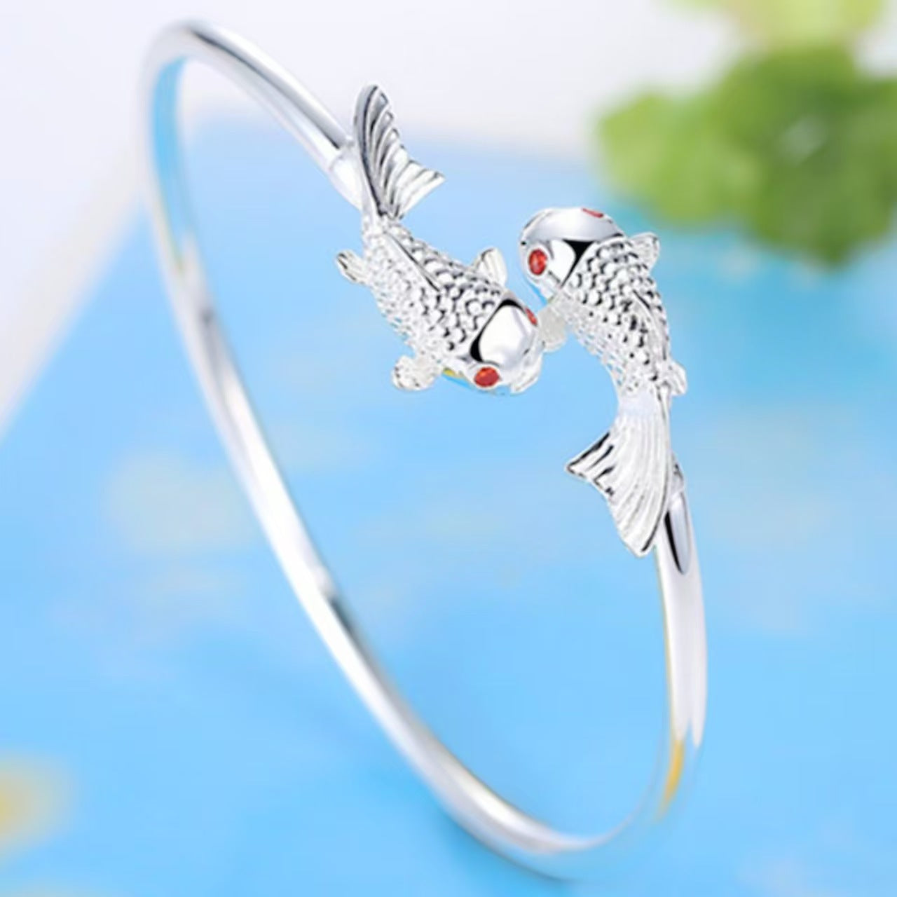 Silver-tone double koi fish red-eye bracelet
