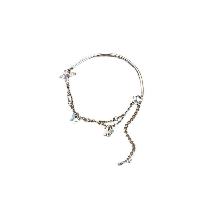 Silver-tone butterfly cubic zirconia tassel bracelet