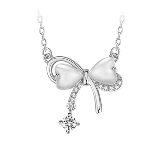 Bow pendant tassel necklace with delicate drop-chain detail
