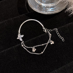 Silver-tone butterfly cubic zirconia tassel bracelet